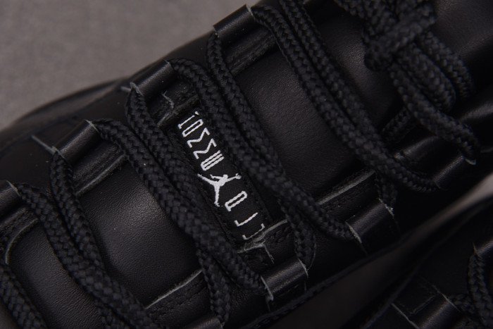 Comme des Garçons x Air Jordan 11 “Triple Black” IV7639-001